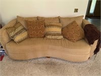 Couch, pillows, blanket
