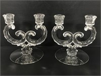 Pair of elegant glass double candlestick holders