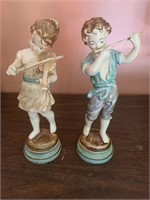 Pair of figurines - children playing musical