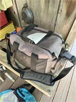 Canvas fishing bag full of fishing worms