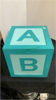 ABC storage box measures 10 x 10 x 10. Includes