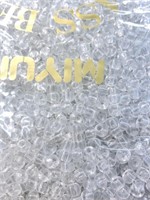 Miyuki 5 mm glass pony beads. Transparent