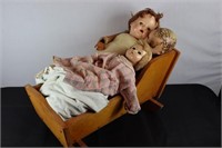 Vintage Dolls in Cradle
