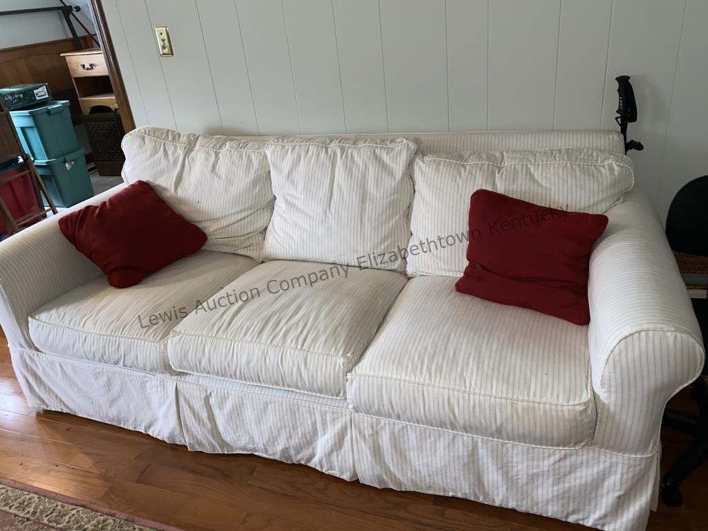 Three cushion sofa, has couch cover that can be