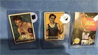 Two topps boxing cards and a basketball court