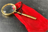 Brass magnifying glass with velvet pouch 4" long