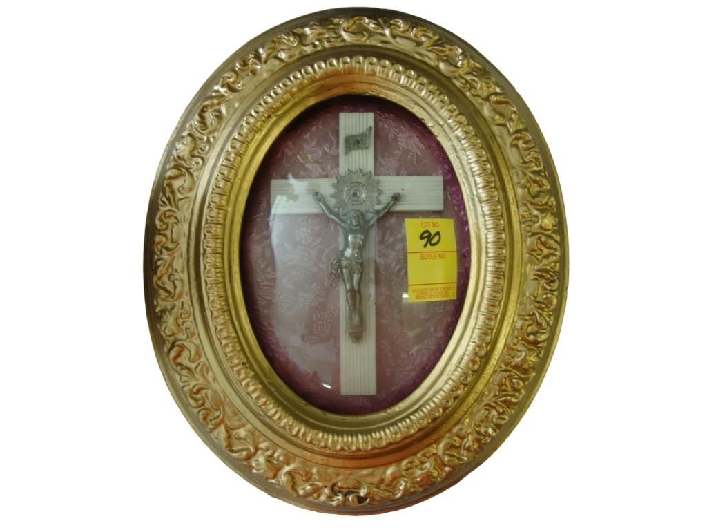 TOC Crucifix in oval convex gilt frame