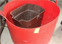 red feeder bucket and water bucket