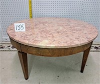 red cultured marble top coffee table  32 dia.