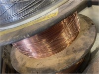 SPOOL OF COPPER WELDING WIRE