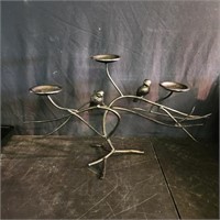 Metal candle holder sculpture