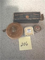 Antique sharpening stone, tape measures