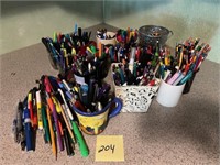 Pens, pencils, markers, cups, vases, etc