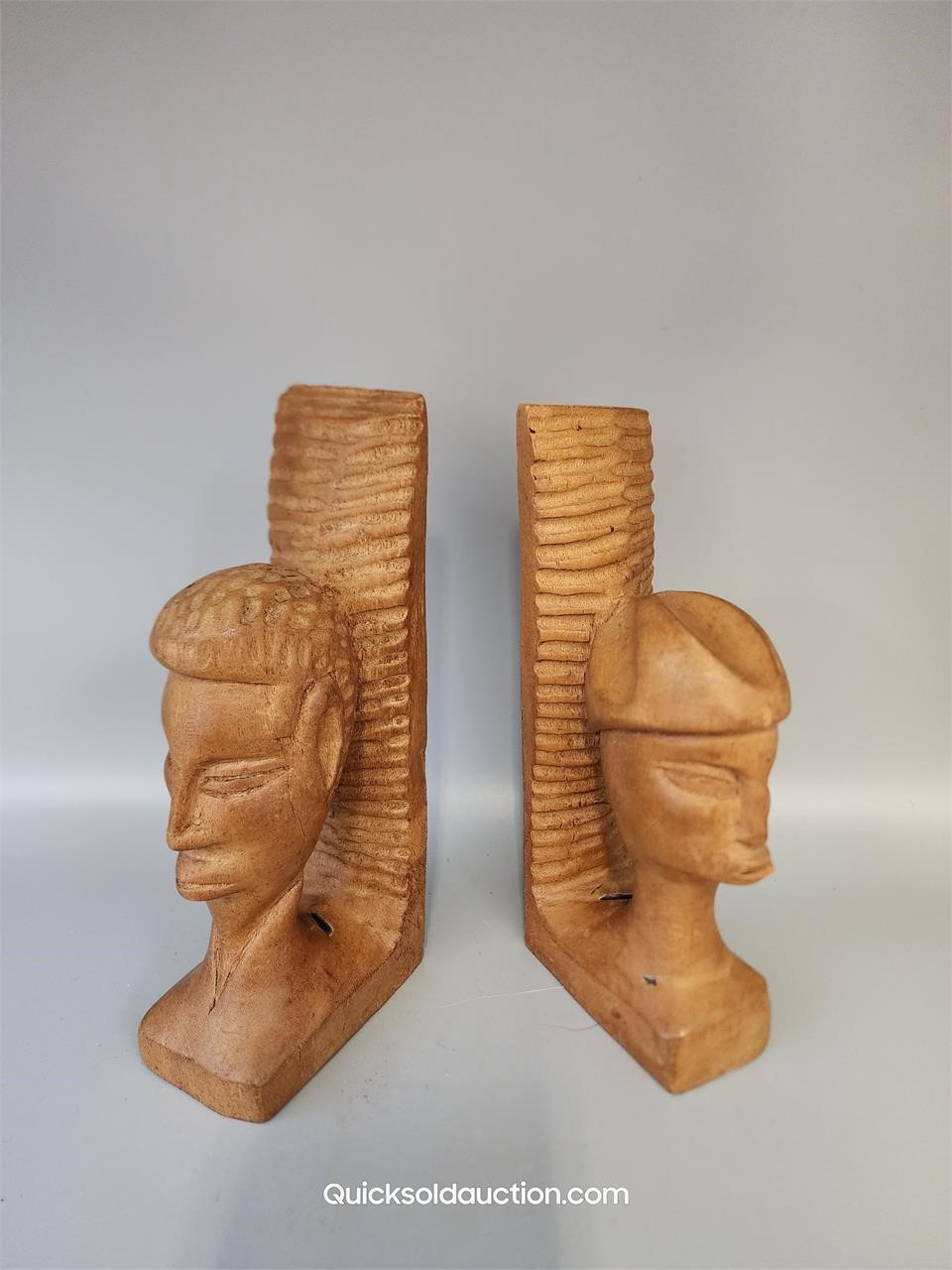 Two Wood Carved Bookends