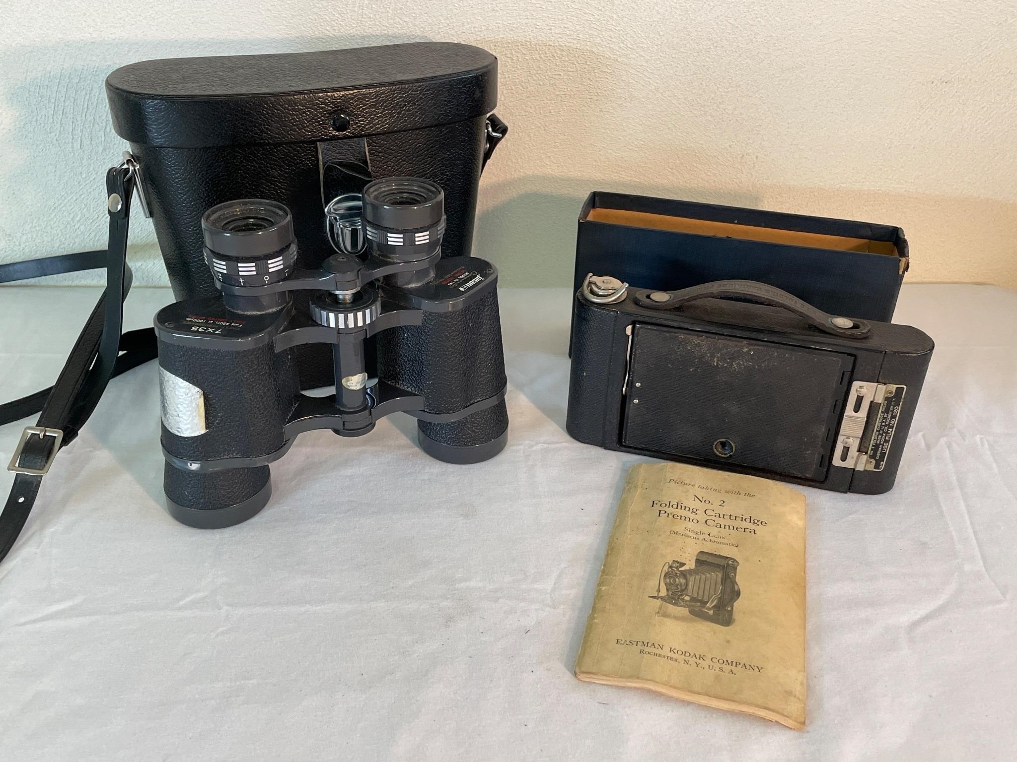 Antique folding cart. Premo camera and binoculars