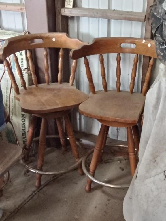 2 wood swivel bar stools
