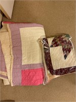 1 Handmade Antique Quilt and 1 pillow Sham.