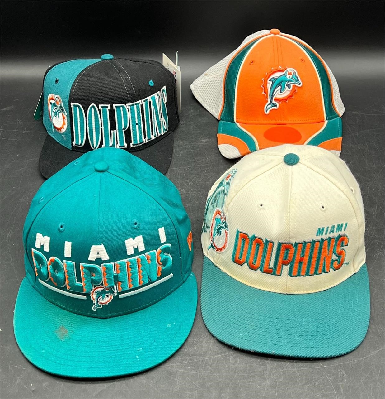 4 NFL MIAMI DOLPHINS HATS   (1 NEW w/ TAGS)