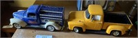 Stand Table and 2 Toy Trucks