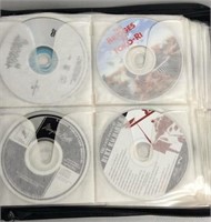 41 DVD/CD Lot With Carrying Case