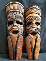 Pair of carved wood tiki masks