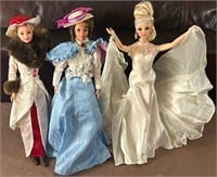 J - LOT OF 4 COLLECTIBLE BARBIE DOLLS (L112)