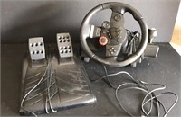 Lot of car gaming pedals and wheel.