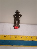 Metal cowboy figurine