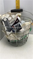 GOLF BASKET WITH NEW AND USED GOLF BALLS