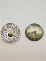 Two paperweights