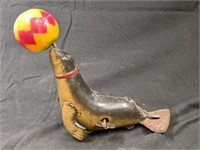 Vintage 5" Tin Seal Balancing Ball Wind Up Toy