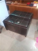 Table with removable tops full of clothing