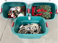 Three tubs of cords and Christmas decor