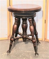 Antique organ stool with claw feet