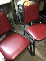 2 New Dark red vinyl stack chairs