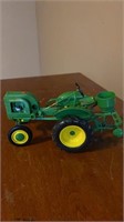 JD toy tractor w/planter