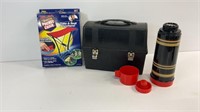 Vintage black lunchbox with thermos and The