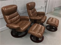 Pair Of Leather Arm Chairs And Footstools