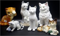 Six various porcelain cat figurines