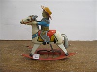 Cowboy on Rocking Horse Tin Toy Wind Up
