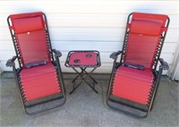 PAIR OF LOUNGE CHAIRS AND SIDE TABLE