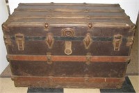 Antique travel trunk. Measures 23.5" h x 36" w x