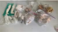 Assorted doll parts, china, bisque, limbs, eyes