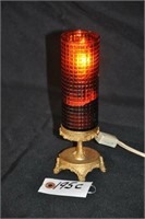 Antique glass amber bed lamp w/ C.I. base, 8" T