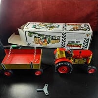Brand new Zetor tin toy tractor