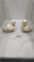 2 ceramic white and yellow duck figurines
