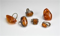 Lot of amber and silver rings