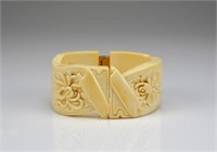 A foliate carved ivory bracelet