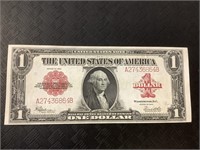 Red seal one dollar bank note.