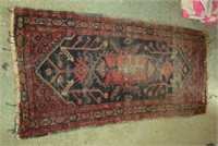 vintage Oriental rug apx. 58" x 28"